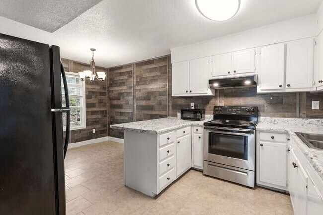 Building Photo - 4BR/2BA Piedmont Home with Flexible Layout + Detached Garage