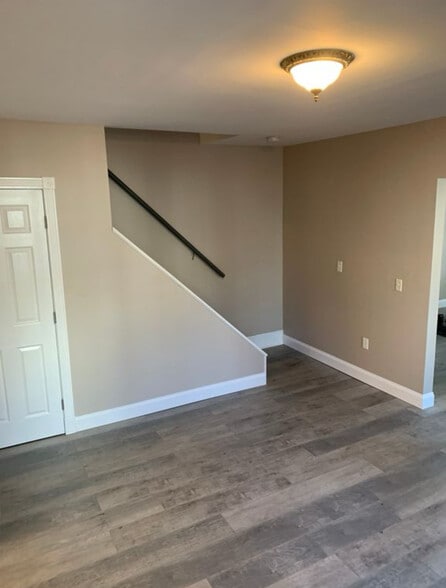 Dining room with stairs to second floor bedrooms. - 1744 Farmington Ave