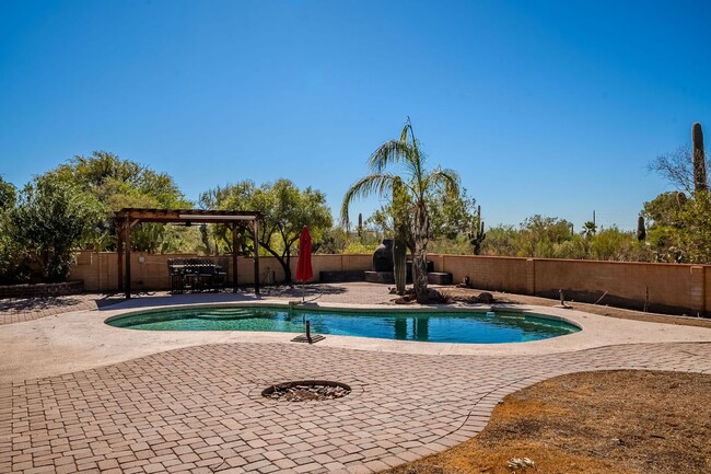 Building Photo - Hacienda-Style Gem with Pool – Spacious 3-...