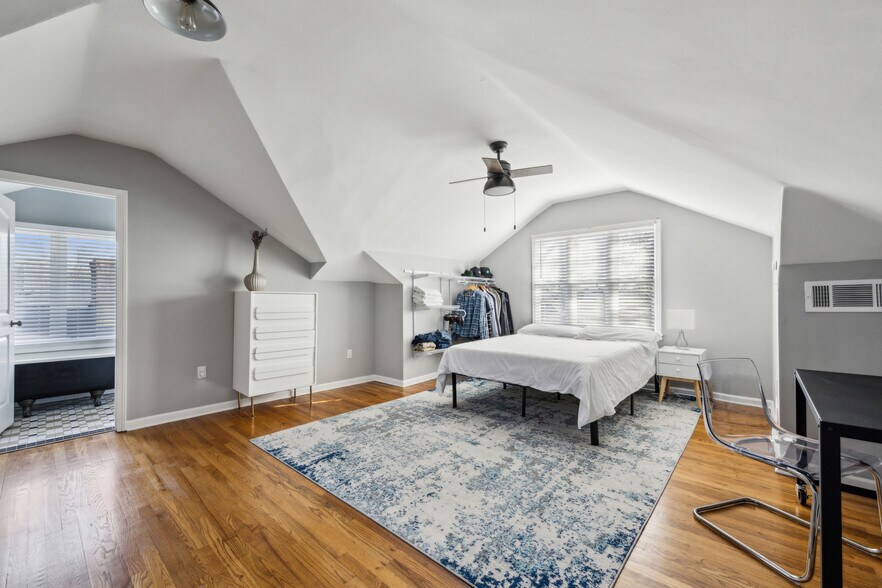 This lofted area comes furnished with bed, dresser, desk and chair and bookcase. - 1118 Colquitt Ave NE