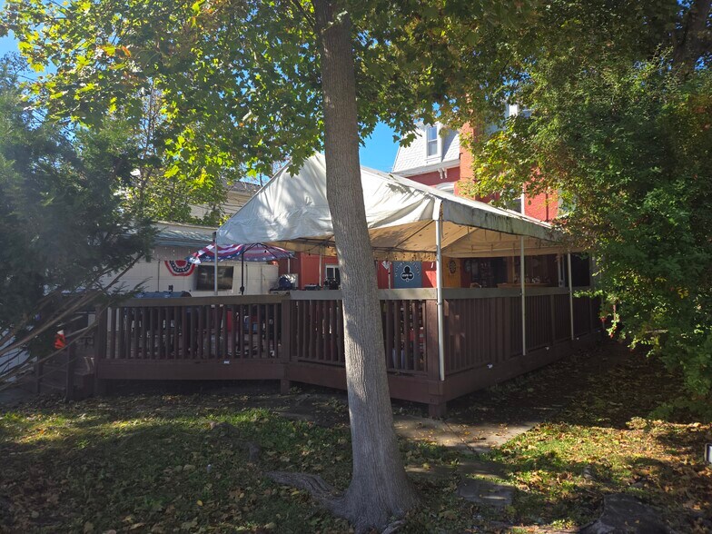 Private back Deck with tent and bar area - 41 Main St