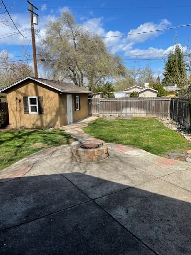 Building Photo - One of a kind Garden Tract home- Detached Garage