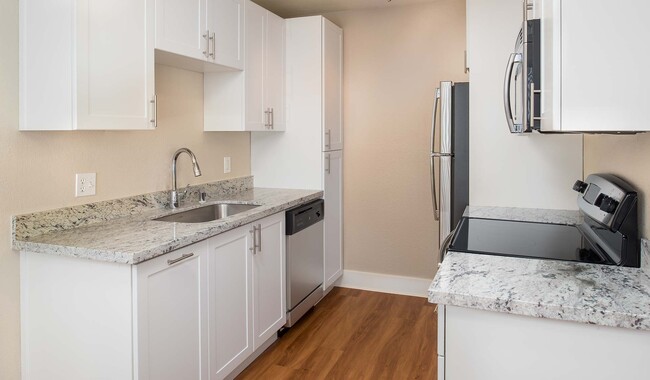 Separate dining room space adjacent to the kitchen - Pacifica Park Apartments