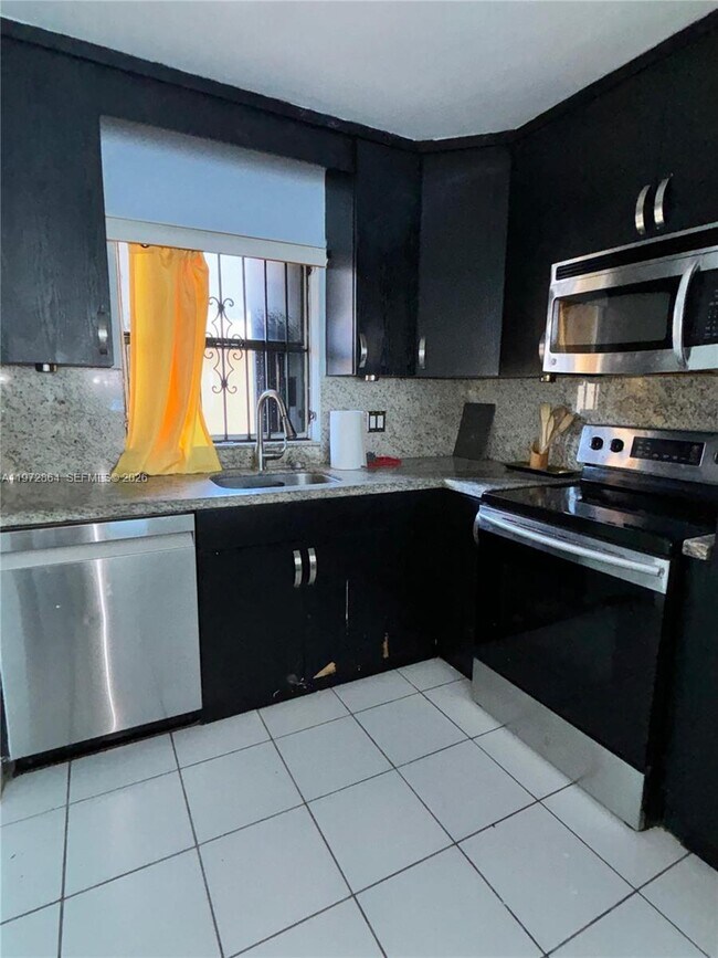 Building Photo - 6715 W 26th Dr