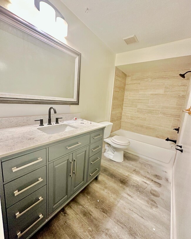 Remodeled upstairs bathroom - 2858 Wonderwood Ln