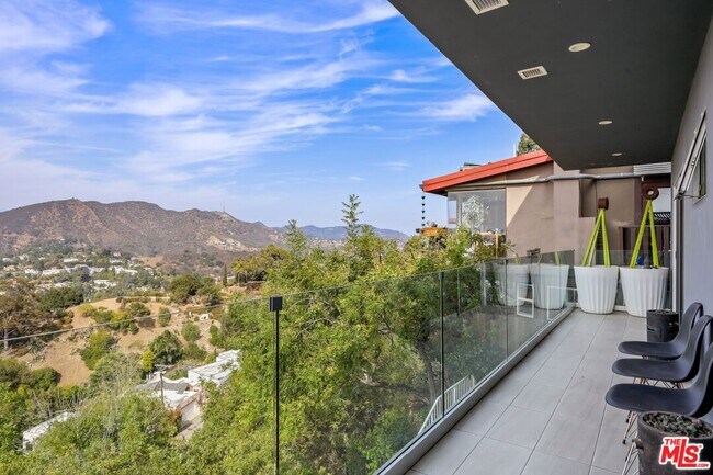 Building Photo - 7191 Pacific View Dr