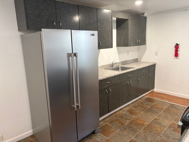 Building Photo - Charming 3 Story Brick Townhome Now Available