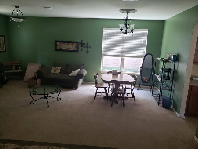 Open living/dining room with lots of natural light - 1824 Bayland St
