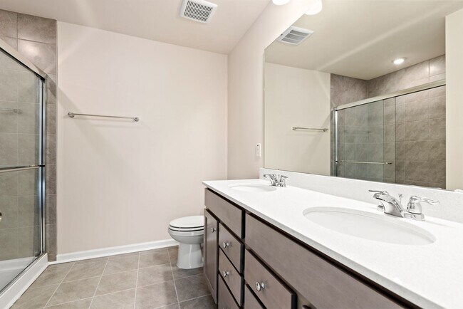 Building Photo - Like-New Townhome Walk to Downtown | Garage + Internet Included