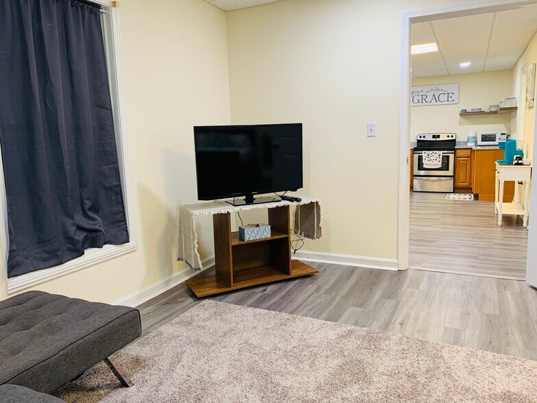 A welcoming retreat perfect for relaxation after a productive day. This room features ample natural - 2337 Ashmel Ct SW