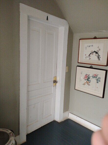 Main entrance to apartment A unit - 219 West Bell Street