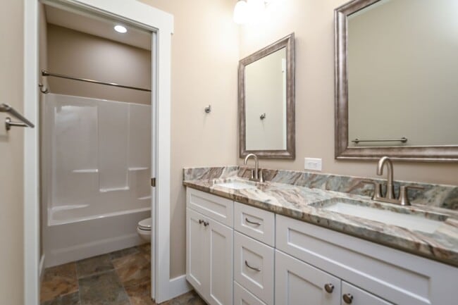 Building Photo - Beautifully Updated 3 Bedroom Home with Sunroom, Two-Car Garage, and Upscale Finishes