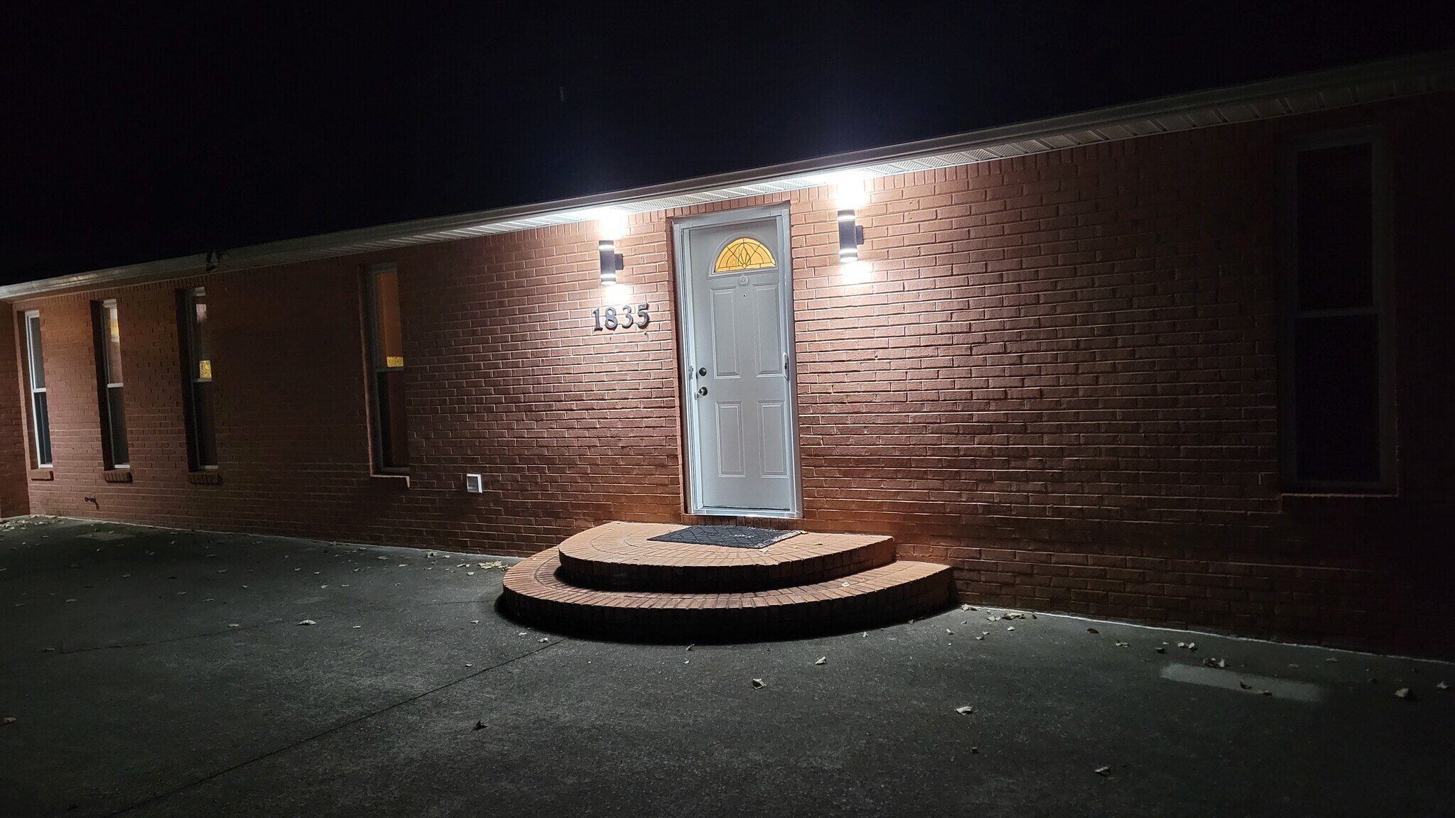 Front Door at Night - 1835 River Rd