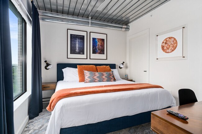 Building Photo - Midtown Magic: Big Savings + Big Perks!