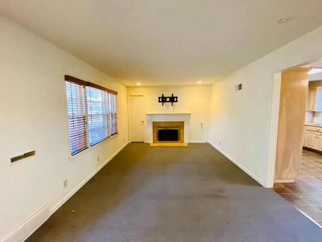 Building Photo - {5639} Spacious Ranch + Two Separate Living Quarters + Fenced Yard!