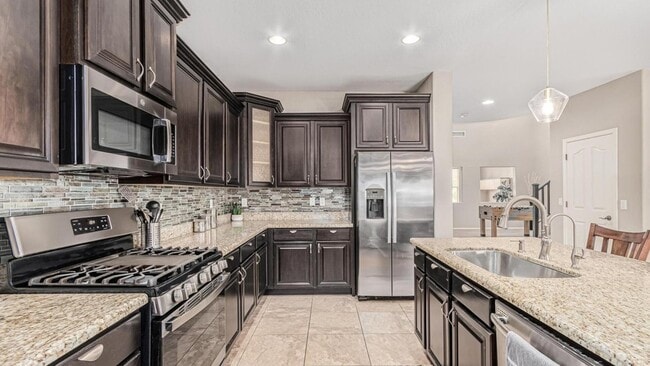 Building Photo - 7657 S Debra Dr