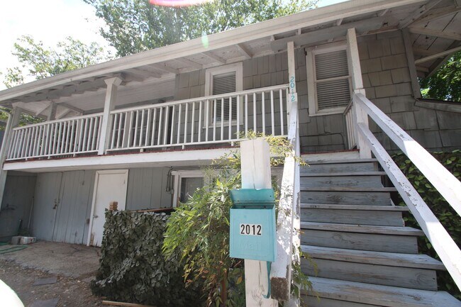 Building Photo - Simply the BEST! Adorable 1 Bedroom/1 Bath upstairs apartment home Located off Historic Camp Bowi...