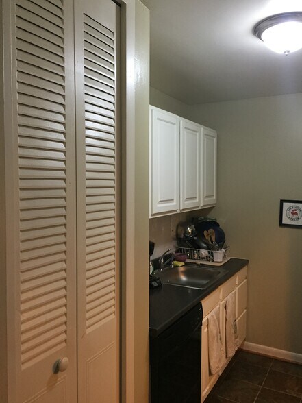 Kitchen with gas range/oven, full fridge/freezer, microwave, sink with garbage disposal. - 2030 F St NW