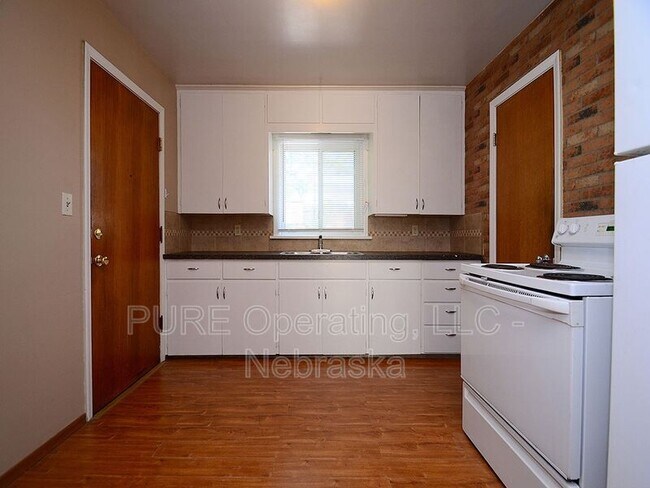 Building Photo - 210 N 32nd Ave