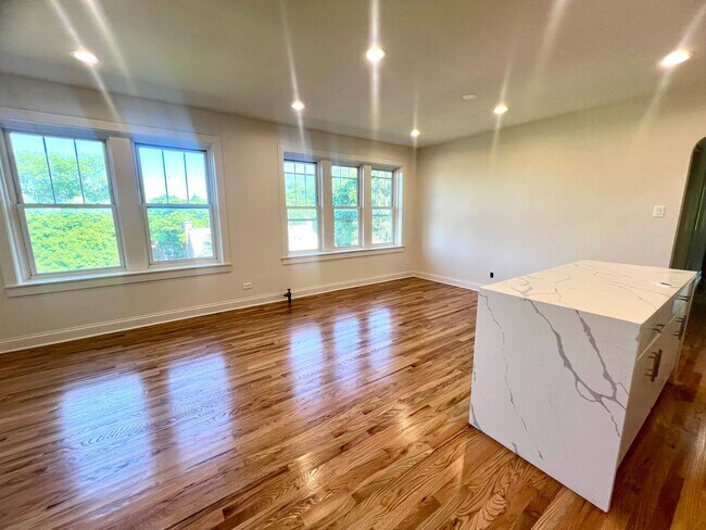 Building Photo - Brand New Renovation! 3 BR/ 2 BA On Quiet ...