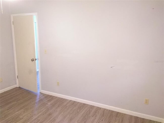 Building Photo - 9529 E Village Green Cir
