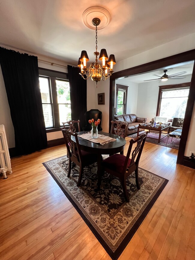 Formal dining room with view into the open living room. - 2424 Stevens Ave