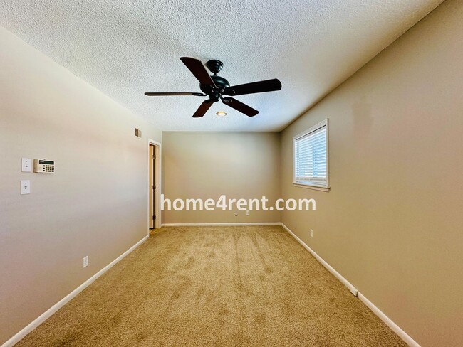 Building Photo - Beautiful Overland Park Townhome w/ Wood Floors, Large Open Kitchen and a Community Pool!