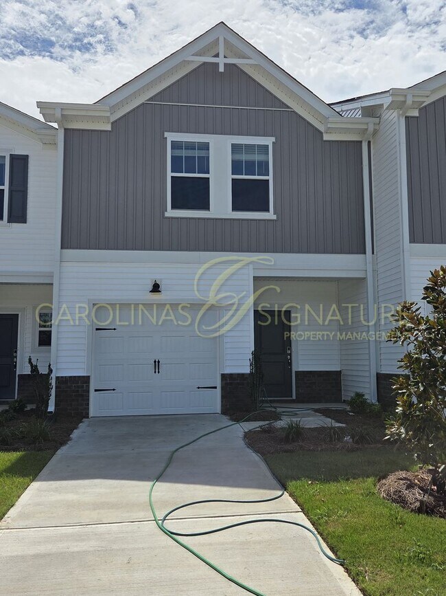 Building Photo - AVAILABLE SEPTEMBER 1! NEW CONSTRUCTION; 3...