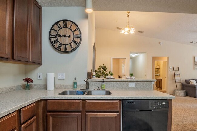 Building Photo - Heron's Landing End Unit Overlooking the Sparkling Community Pool