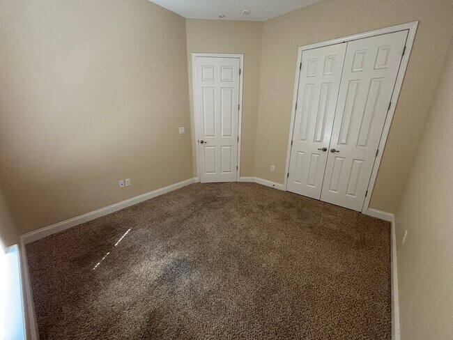 Building Photo - Spacious 4BR/3BA Home with 3-Car Garage, Bonus Office & Covered Patio in St Johns!