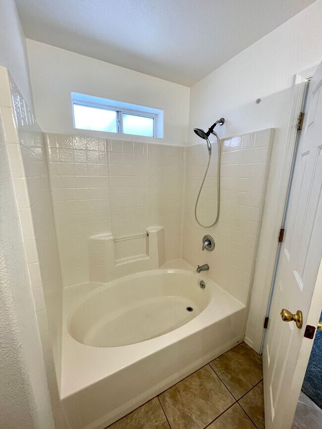 Building Photo - Inviting 3 Bedroom Home with RV Parking an...