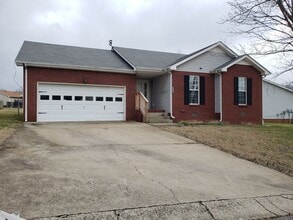 Building Photo - Close to Post! No Carpet! Lovely 3 Bed/2 Bath fenced in backyard!