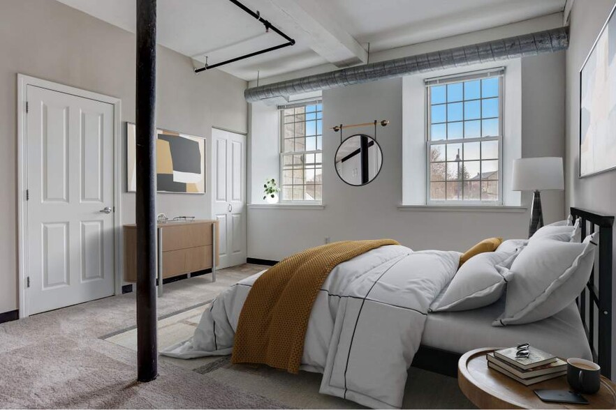 Spacious Bedroom With Natural Lighting - Residences at Slatersville Mill