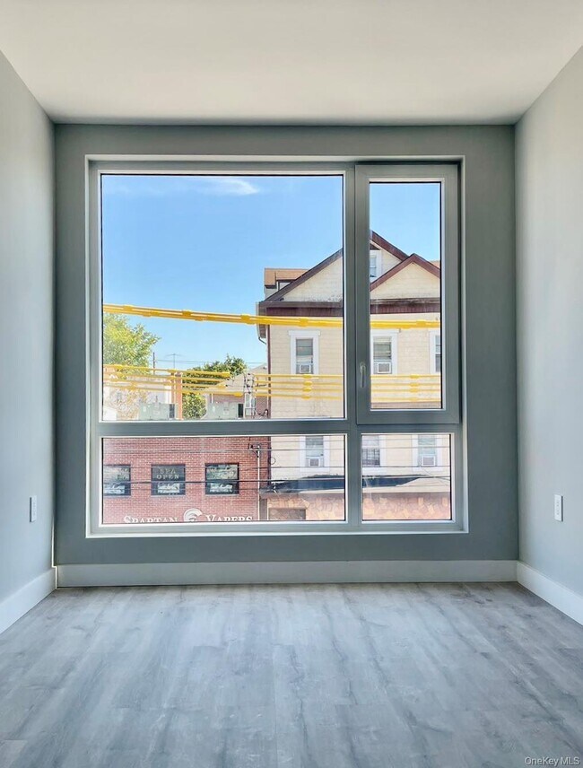 Building Photo - 20-22-22 College Point Blvd