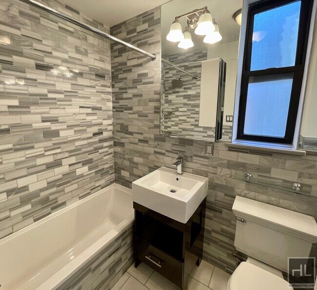 Building Photo - Renovated East Village 2-Bedroom with Pre-...