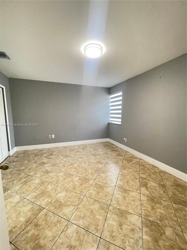 Building Photo - 18310 NW 68th Ave