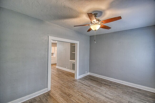 Building Photo - Newly Remodeled Campus Property! Lawn Care Included!