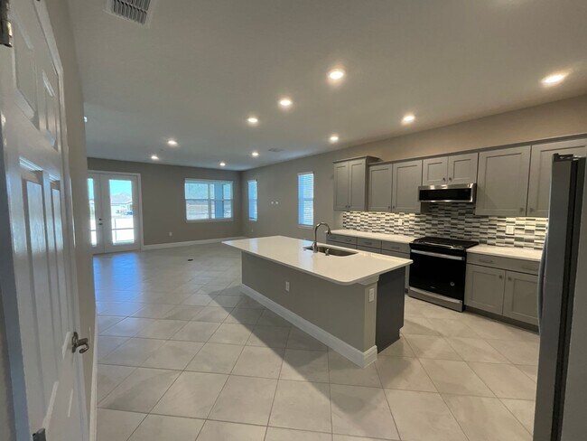 Building Photo - Brand New Home with all the upgrades in an all families community
