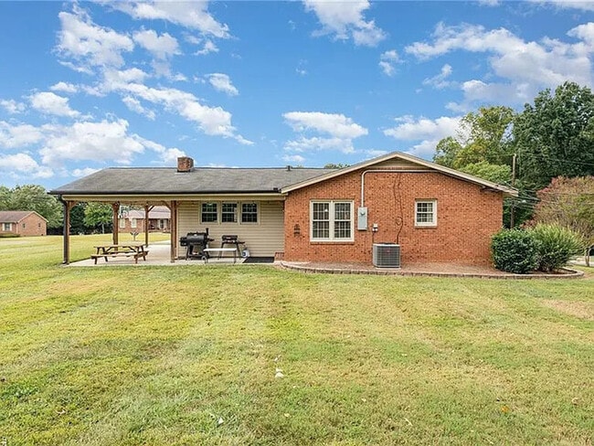 Building Photo - Earn Wealth While Leasing - Like a Homeown...