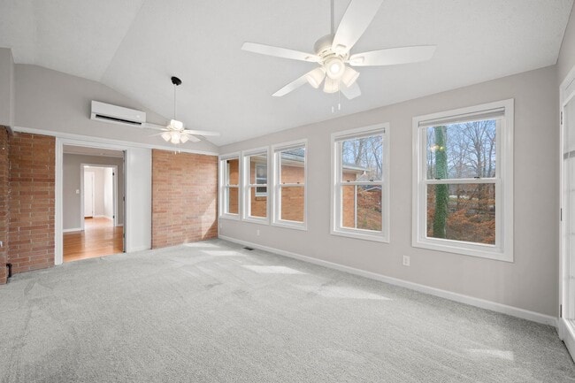 Building Photo - Spacious 4BR (or 3BR + Bonus) with 2 Living Rooms, Screened Porch & 4-Car Garage