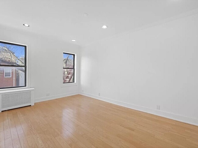 Building Photo - 44-14 Newtown Rd