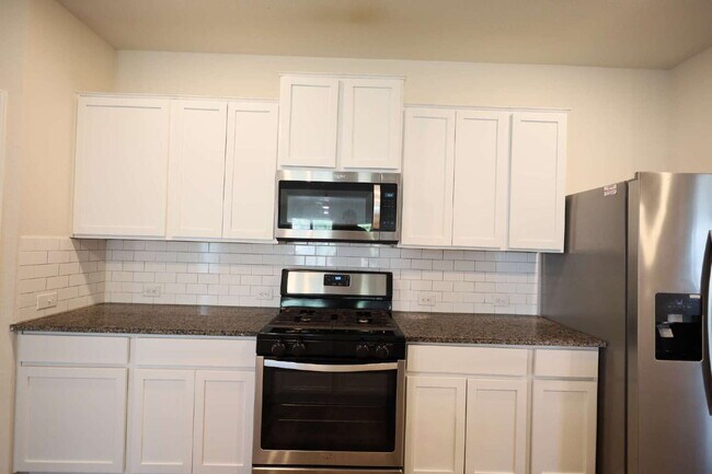 Building Photo - "Charming 4-Bed Sanctuary in San Antonio –...