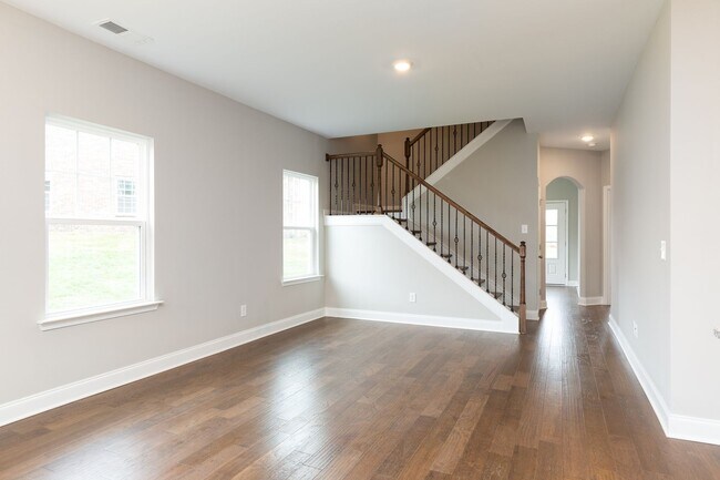 Building Photo - **BE THE LUCKY ONE TO LIVE IN THIS 2022-BUILT UPSCALE COTTAGE HOME IN THE PRESERVE AT BELLE POINTE**