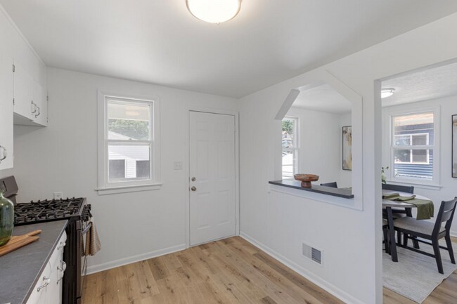 Building Photo - Updated South Omaha Home with Oversized Ga...
