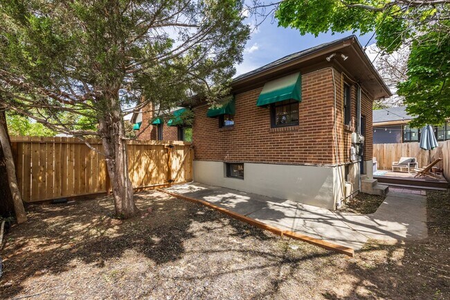 Building Photo - Charming 1935 Tudor in 15th & 15th – Renovated with Modern Luxury