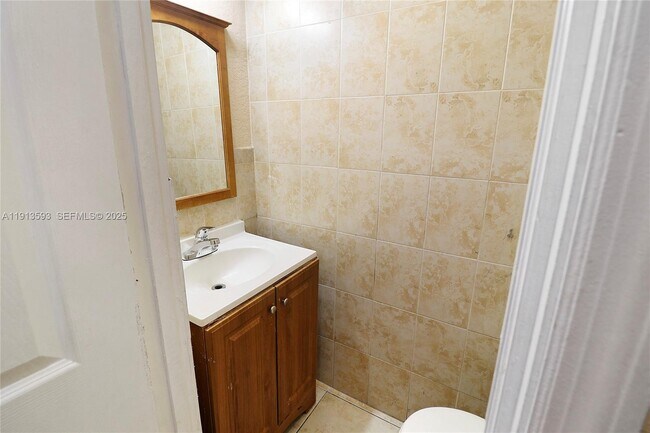 Building Photo - 5975 NW 25th Ct