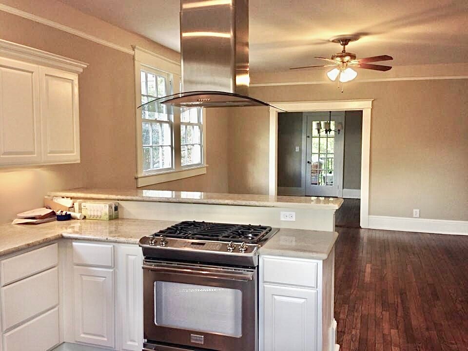 Kitchen to living to dining to screened porch - 1217 Foucher St
