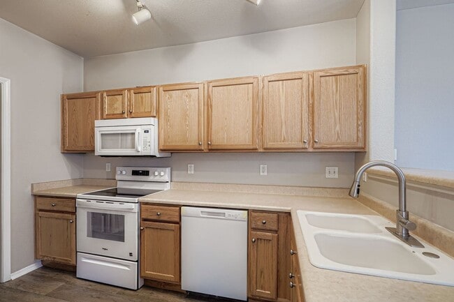 Building Photo - Move in Ready- Ground floor condo in covered Lodge at Terralago. Swimming Pool- Hot Tub and Fitne...