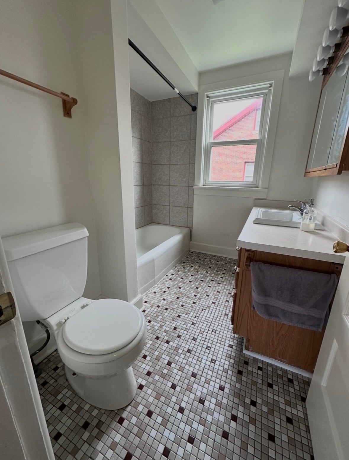 Full bathroom 1 on the main floor. Tub and Shower combo. - 2712 S 9th St