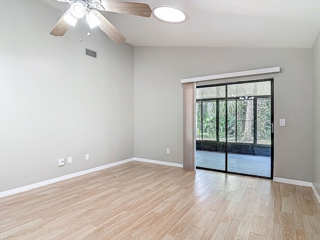 Building Photo - UPDATED 2 Bed, 2 Bath Home with Screened Lanai & Garage!